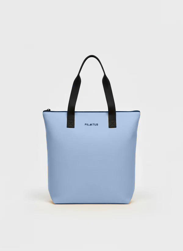 Parte frontal de la shopper bag de color azul cielo.