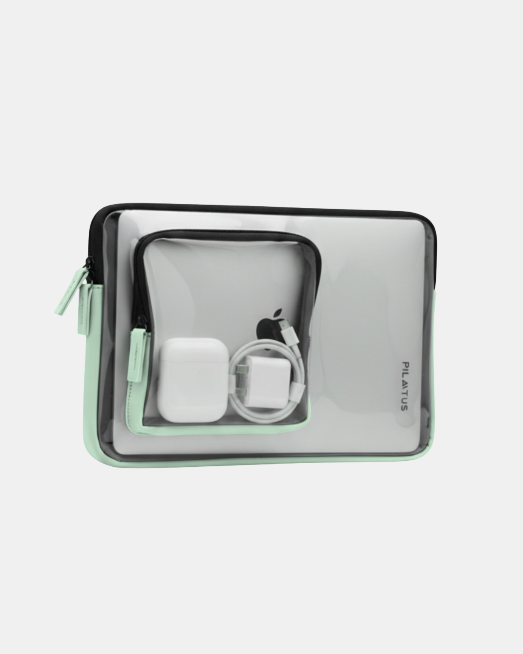 Estuche transparente para electrónicos con borde verde menta, bolsillo frontal que contiene cargador y cable. Texto: PILATUS