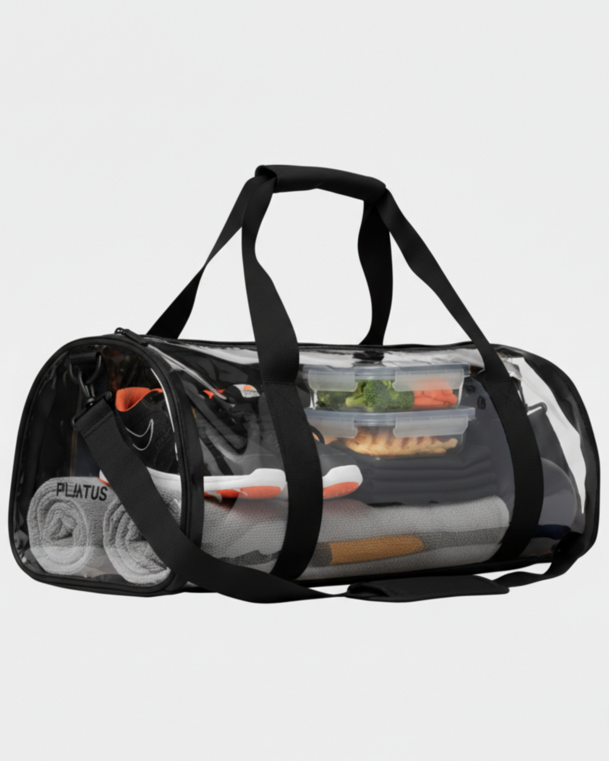 Bolsa deportiva transparente con asas negras; contiene toallas enrolladas (texto: PILATUS)