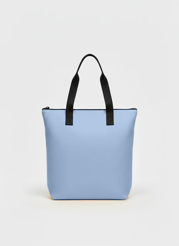 Parte trasera de la shopper bag d color azul cielo.