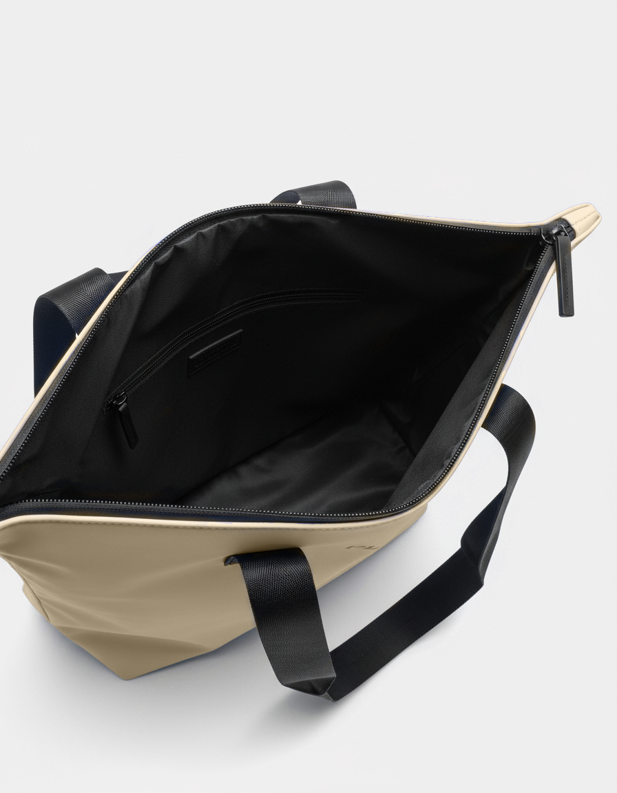 Parte interior de la shopper bag beige sand.