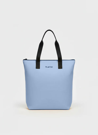 Parte frontal de la shopper bag de color azul cielo.