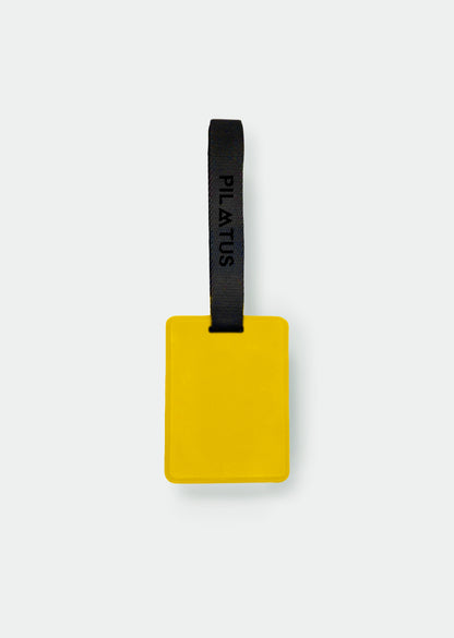 Parte trasera del travel tag amarillo.